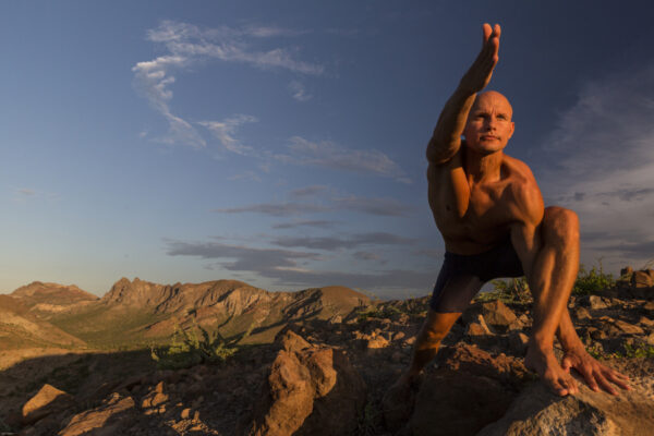 Doing yoga on a mountain site